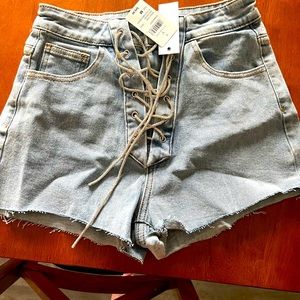 Nothing short of glam rhinestone lace up shorts